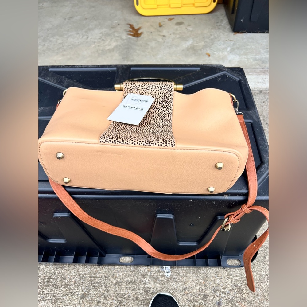 Beige purse with animal print trim, new never used